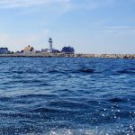 Old Scituate Light from the water just off the coast of Scituate, Massachusetts
