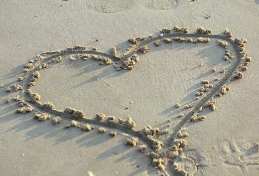 a heart drawn in the sand