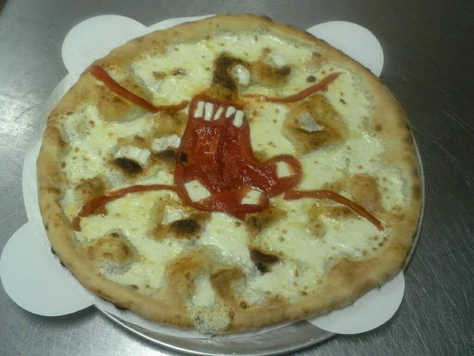 Pizza with red sauce